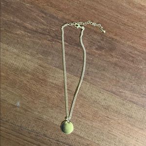 Gold necklace with circle charm
